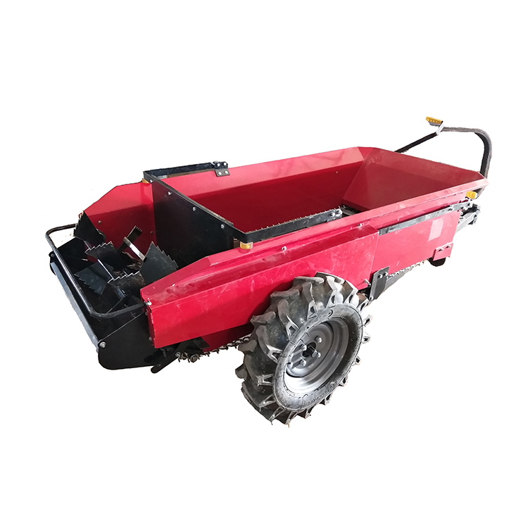 Traktor penyebar baja