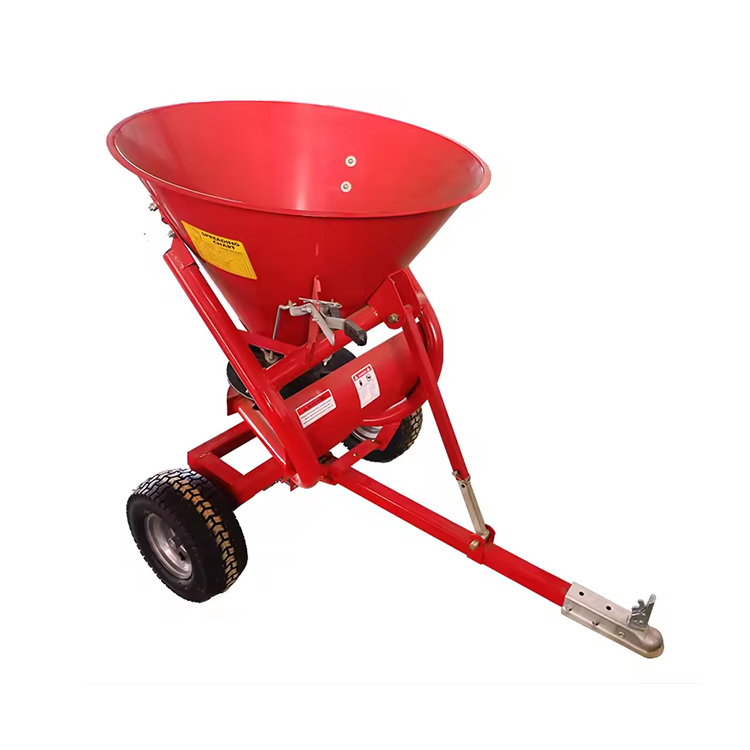 Penyebar traktor yang dipasang
